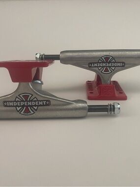 Red & Silver Skateboard Trucks -